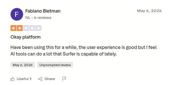 A user review on Trustpilot, discussing how Surfer SEO is an okay platform.
